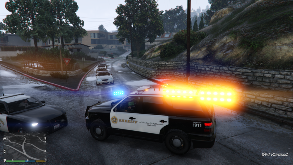 Could contain: vehicle, land vehicle, wheel, outdoor, tire, road, auto part, screenshot, tree, car, transport, sky, truck, street, light, ground