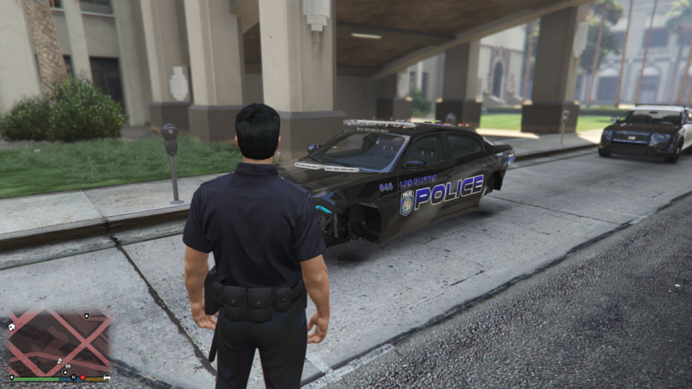 Could contain: land vehicle, vehicle, wheel, outdoor, clothing, tire, person, building, man, footwear, transport, road, trousers, car, ground, police