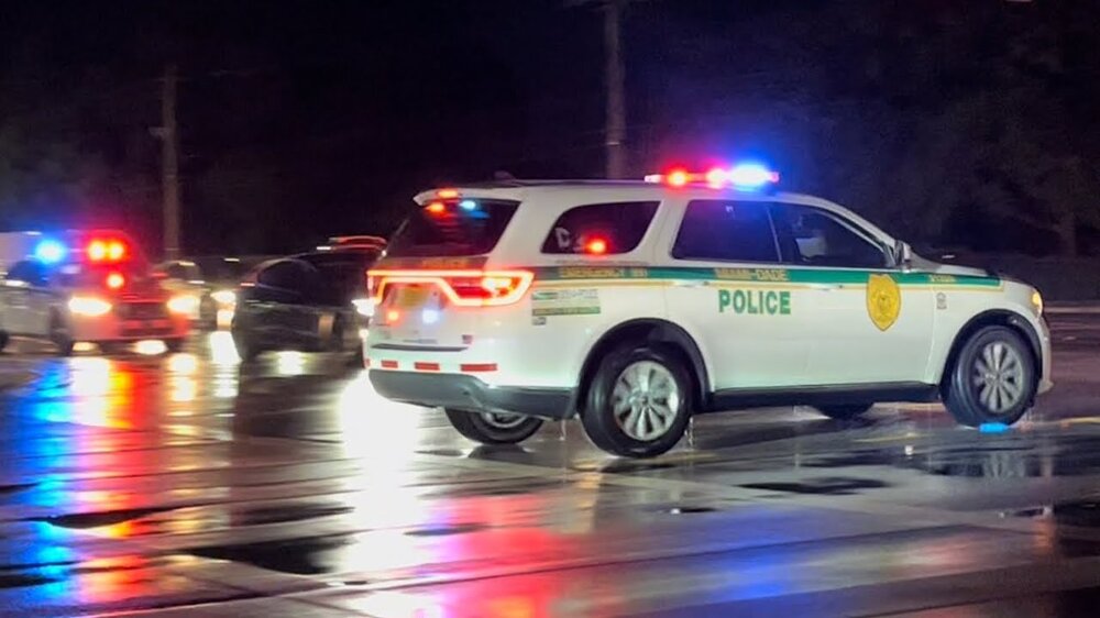 Could contain: vehicle, land vehicle, wheel, transport, emergency service, emergency vehicle, tire, outdoor, emergency, police, police car, road, auto part, automotive exterior, law enforcement, street, light, car, fire, night