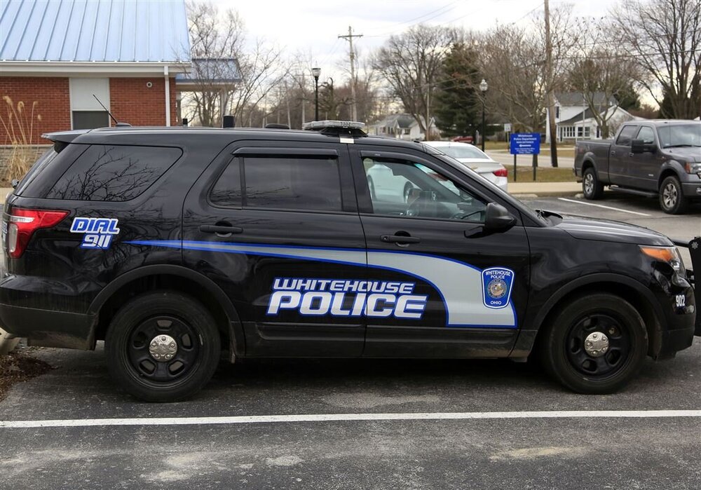 Could contain: vehicle, land vehicle, wheel, tire, text, transport, outdoor, auto part, sport utility vehicle, car, bumper, law enforcement, police car, automotive exterior, vehicle registration plate, compact sport utility vehicle, ford, roof rack, automotive luggage rack, automotive carrying rack, police, motor vehicle, crossover suv, suv, parked, van