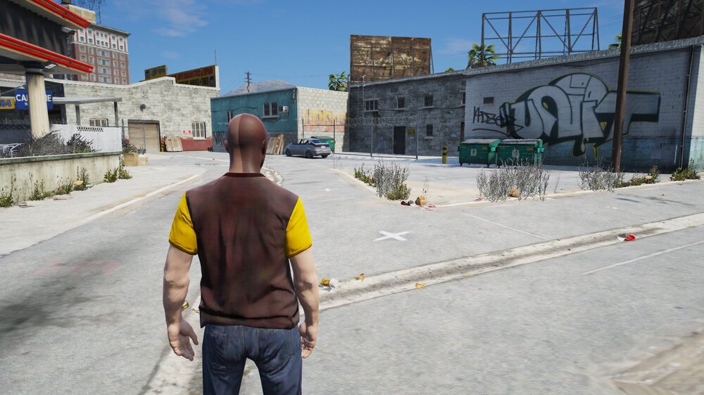 Could contain: outdoor, clothing, sky, building, person, man, footwear, jeans, cloud, road, ground, way, street