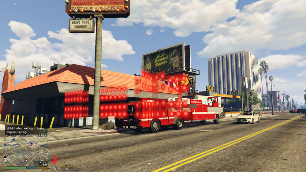 Could contain: sky, outdoor, cloud, billboard, land vehicle, vehicle, text, road, sign, street, red