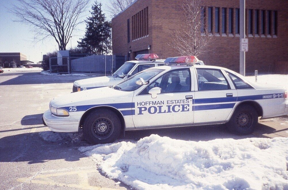 Could contain: vehicle, land vehicle, outdoor, transport, wheel, police car, law enforcement, ford crown victoria police interceptor, police, full-size car, emergency service, car, emergency vehicle, snow, street