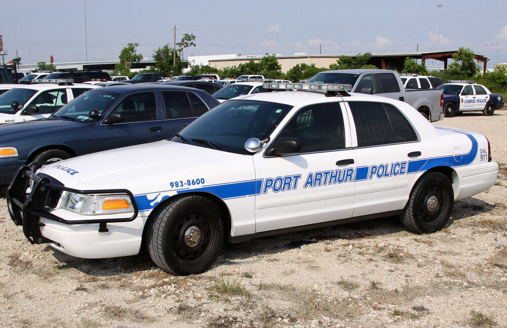 Could contain: vehicle, land vehicle, wheel, transport, outdoor, police car, law enforcement, full-size car, ford crown victoria police interceptor, police, tire, sedan, car, ford, text, parked