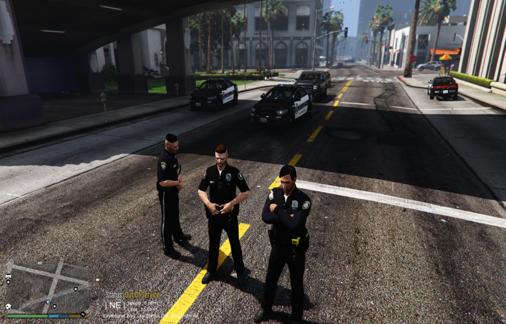 Could contain: outdoor, vehicle, person, land vehicle, road, car, clothing, ground, officer, police, street, wet suit