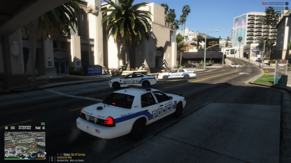 Could contain: vehicle, land vehicle, outdoor, police, wheel, text, car, transport, road, building, police car, street, city