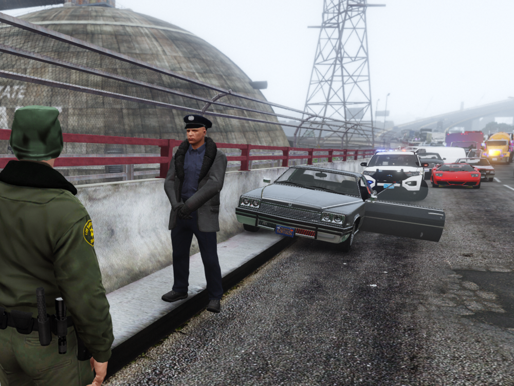 Could contain: sky, clothing, vehicle, land vehicle, outdoor, person, man, wheel, jacket, car, tire, ground, people