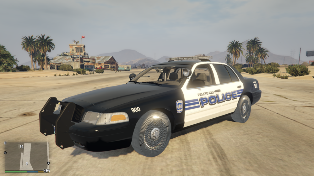 Could contain: vehicle, land vehicle, wheel, sky, outdoor, tire, transport, ground, motorsport, automotive tire, auto part, road, car, police