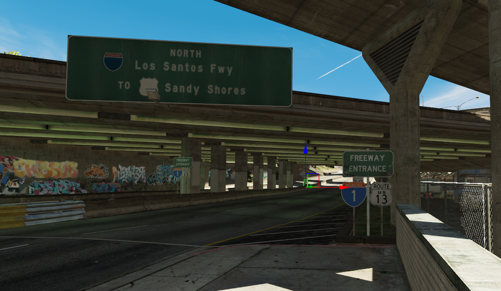 Could contain: outdoor, sky, text, infrastructure, billboard, screenshot, sign, bridge, track, street