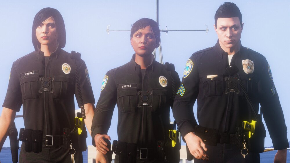 Could contain: person, sky, clothing, outdoor, human face, uniform, security, police officer, crew, man, law enforcement, government agency, officer, standing, posing, group, people