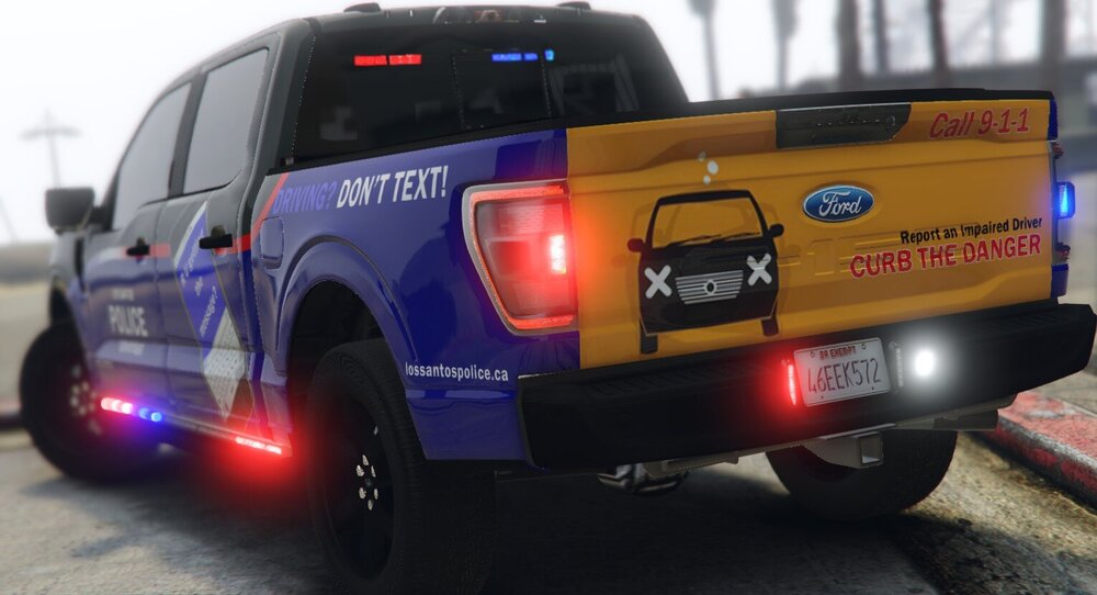 Could contain: land vehicle, wheel, text, tire, transport, car, auto part, vehicle registration plate, outdoor, automotive exterior, road, motor vehicle, bumper, automotive tail & brake light, sport utility vehicle, automotive tire, van, fender, automotive lighting, mode of transport, automotive luggage rack, parked, vehicle, street