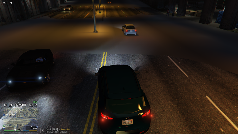 Could contain: vehicle, land vehicle, car, road, screenshot, wheel, text, outdoor, street, night, light