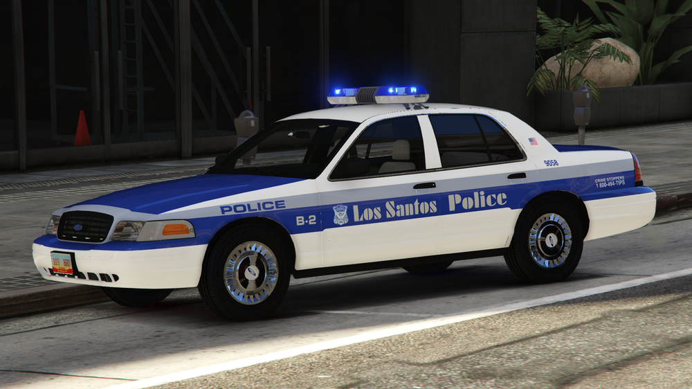 Could contain: vehicle, land vehicle, wheel, police car, law enforcement, transport, full-size car, ford crown victoria police interceptor, outdoor, emergency service, emergency vehicle, text, tire, car, street, police