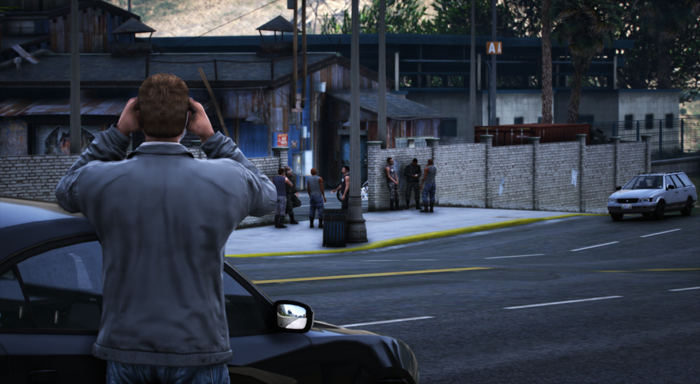 Could contain: outdoor, vehicle, land vehicle, person, road, clothing, building, man, wheel, street, tree, city, police, officer, car