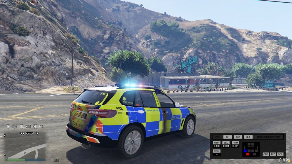 Could contain: vehicle, land vehicle, wheel, outdoor, transport, text, tire, road, auto part, mountain, motorsport, car