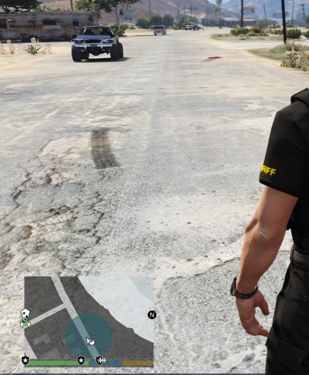 Could contain: outdoor, person, car, land vehicle, clothing, vehicle, ground, text, wheel, tire, hole