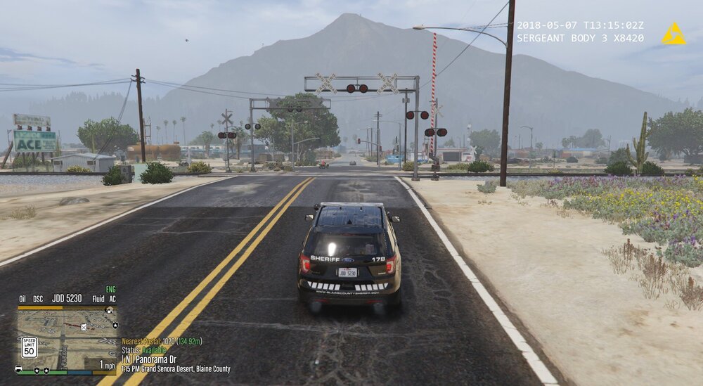 Could contain: outdoor, vehicle, land vehicle, text, sky, road, way, wheel, thoroughfare, asphalt, lane, freeway, road surface, mountain, tarmac, car, roadway, street, highway, ground