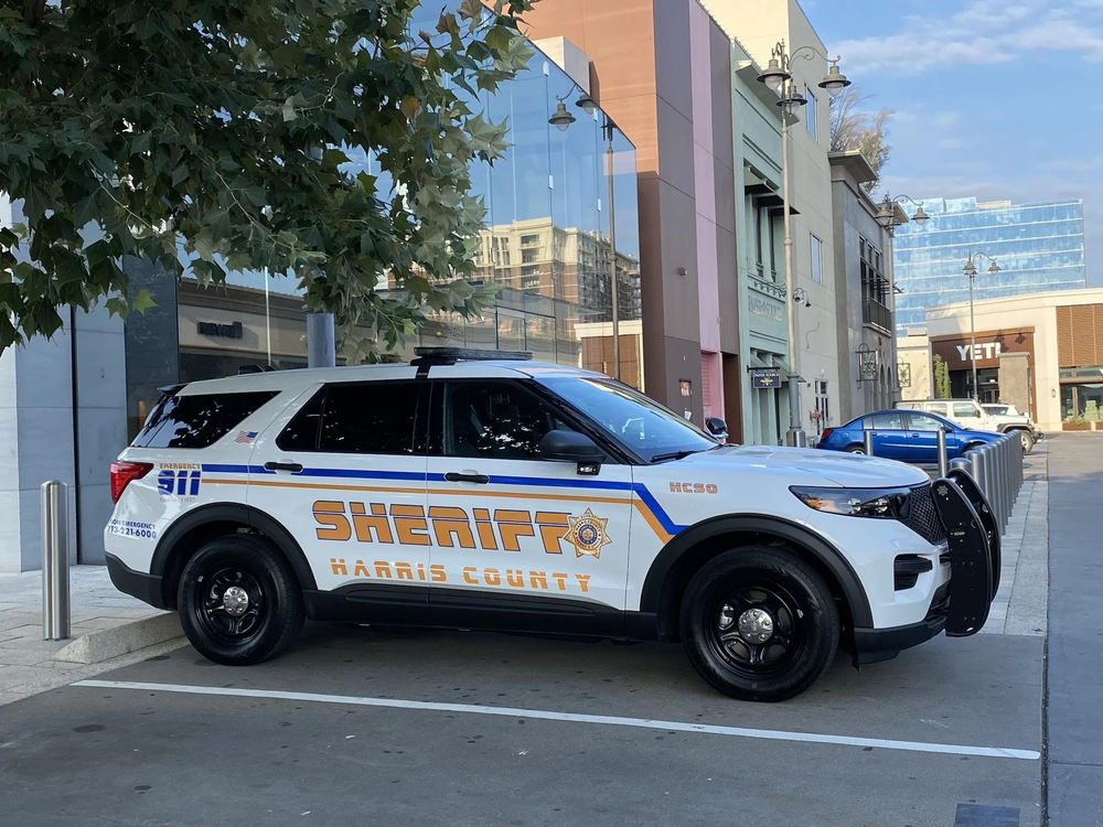 Could contain: vehicle, land vehicle, wheel, outdoor, tire, sky, transport, police, car, text, sport utility vehicle, auto part, police car, automotive exterior, compact sport utility vehicle, bumper, motor vehicle, law enforcement, crossover suv, road, suv, street