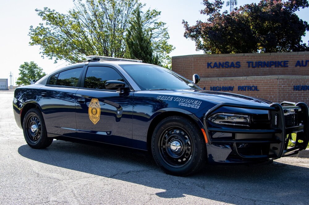 Could contain: land vehicle, vehicle, wheel, tire, outdoor, auto part, bumper, transport, automotive design, chevrolet, automotive exterior, general motors, road, car, parked, police, ground