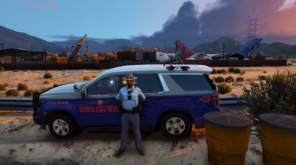 Could contain: outdoor, sky, vehicle, land vehicle, wheel, tire, cloud, transport, ground, sport utility vehicle, mountain, car, parked, person, jeep