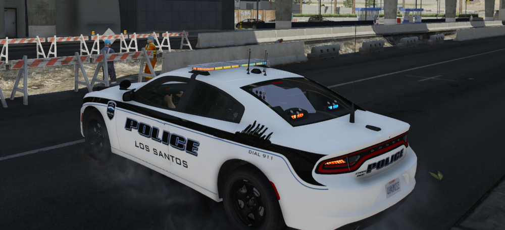 Could contain: vehicle, land vehicle, wheel, transport, police car, full-size car, tire, text, law enforcement, road, car, mid-size car, outdoor, police, street