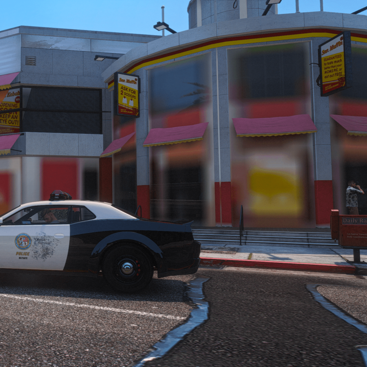 Could contain: outdoor, vehicle, tire, land vehicle, wheel, sky, building, text, ground, road, auto part, car, parked, street, sign, parking, shop