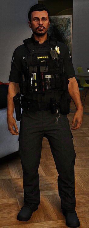 Could contain: person, man, clothing, human face, indoor, trousers, uniform, law enforcement, security, wall, floor, military uniform