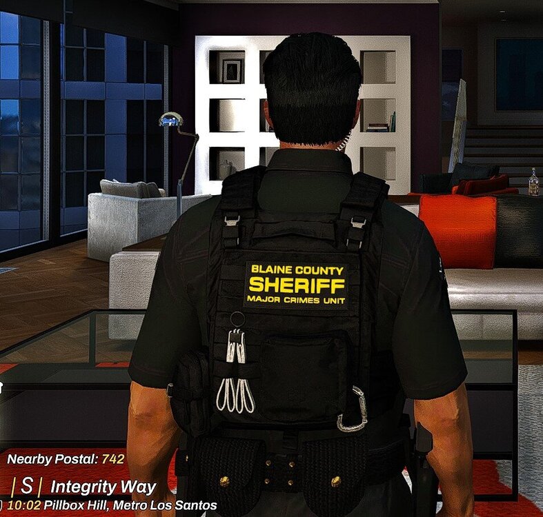 Could contain: text, clothing, person, luggage and bags, man, backpack, screenshot, vest, indoor