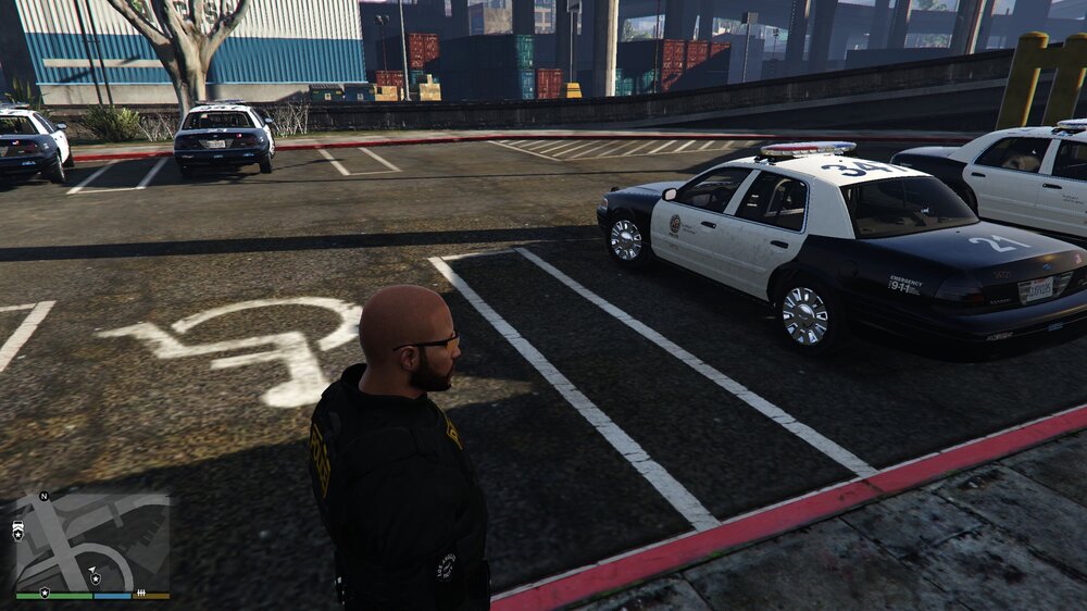 Could contain: vehicle, land vehicle, wheel, outdoor, tire, road, car, auto part, ground, person, street, parking