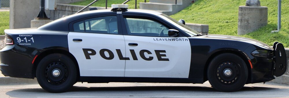 Could contain: vehicle, land vehicle, wheel, outdoor, transport, tire, law enforcement, police car, text, auto part, car, road, police, street