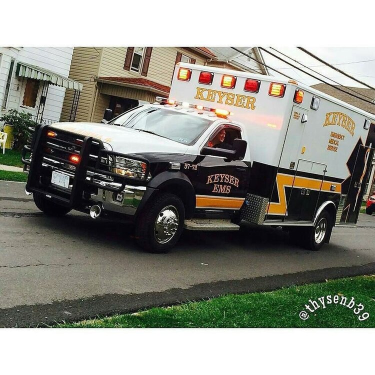 Could contain: vehicle, text, land vehicle, wheel, outdoor, transport, tire, auto part, motor vehicle, emergency service, emergency vehicle, bumper, road, mode of transport, parked, fire, truck, street