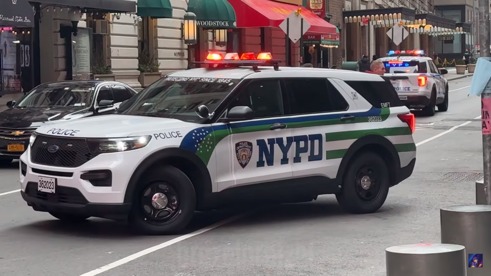 Could contain: vehicle, land vehicle, wheel, text, transport, tire, outdoor, sport utility vehicle, police car, vehicle registration plate, car, bumper, automotive exterior, law enforcement, compact sport utility vehicle, ford, auto part, police, motor vehicle, crossover suv, street, suv