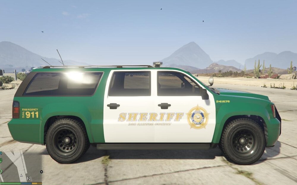 Could contain: wheel, land vehicle, tire, outdoor, transport, sky, auto part, motor vehicle, sport utility vehicle, fender, automotive tire, car, green, parked, mountain, ground, vehicle, jeep