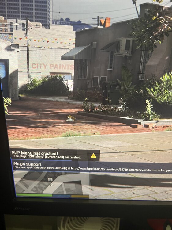 Could contain: text, outdoor, building, tree, screenshot, window, house, billboard, ground, city