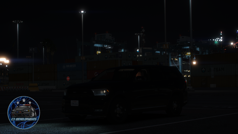 Could contain: vehicle, land vehicle, wheel, outdoor, text, tire, night, car, road, dark, city, light