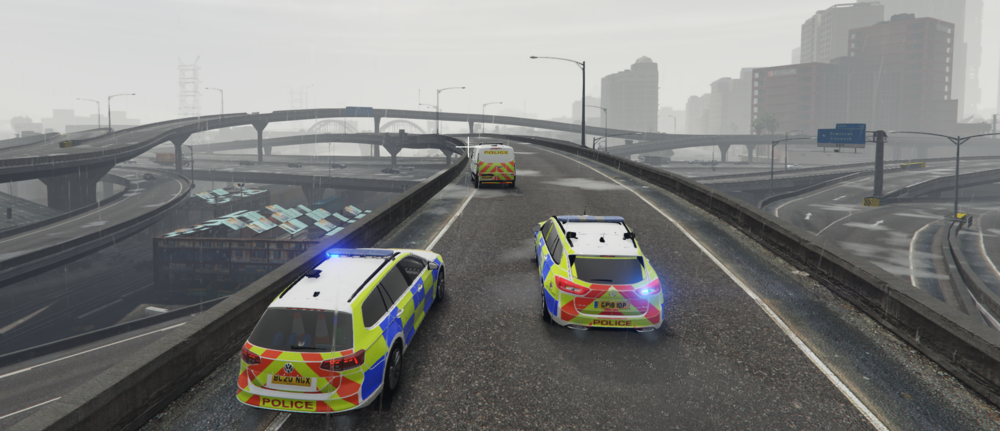 Could contain: vehicle, outdoor, land vehicle, sky, car, road, track, highway, roadway, street, bridge