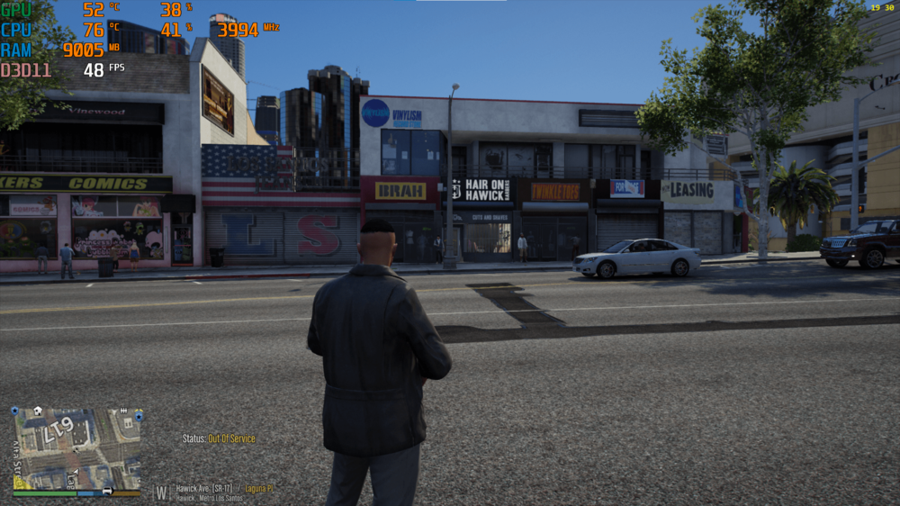 Could contain: outdoor, text, clothing, man, car, sky, land vehicle, road, tree, person, building, vehicle, street, billboard, sidewalk, wheel