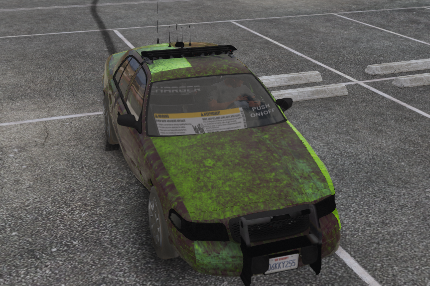 Could contain: vehicle, outdoor, wheel, road, ground, land vehicle, tire, grass, green, car