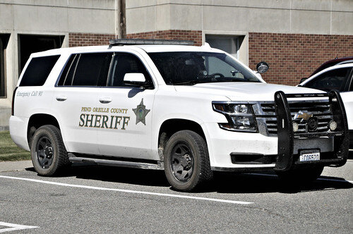 Could contain: vehicle, land vehicle, wheel, tire, sport utility vehicle, bumper, auto part, transport, car, outdoor, police, grille, compact sport utility vehicle, general motors, chevrolet, automotive exterior, motor vehicle, ford, crossover suv, roof rack, automotive luggage rack, hardtop, suv, parked