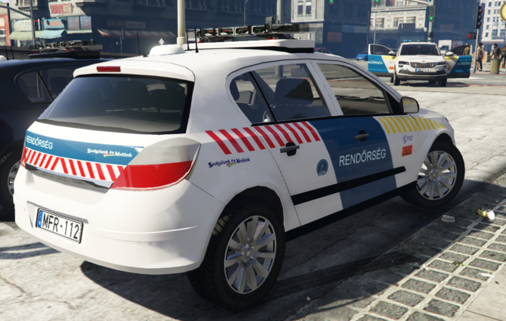 Could contain: vehicle, land vehicle, wheel, text, tire, car, transport, outdoor, vehicle registration plate, hatchback, city car, subcompact car, motor vehicle, auto part, supermini, compact mpv, rim, family car, road, parked, street, police