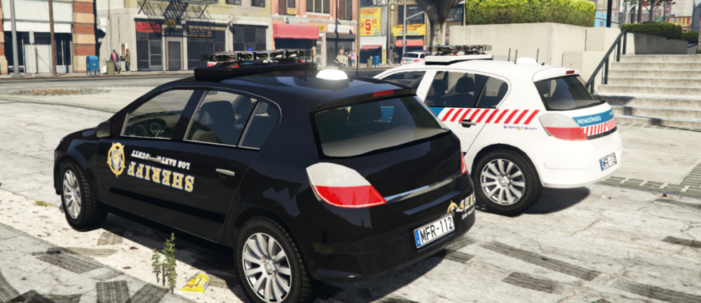 Could contain: text, vehicle, land vehicle, wheel, vehicle registration plate, tire, outdoor, police, car, transport, family car, city car, mid-size car, auto part, full-size car, bumper, hatchback, automotive exterior, subcompact car, ford motor company, rim, police car, motor vehicle, alloy wheel, compact car, compact mpv, sedan, street, parked