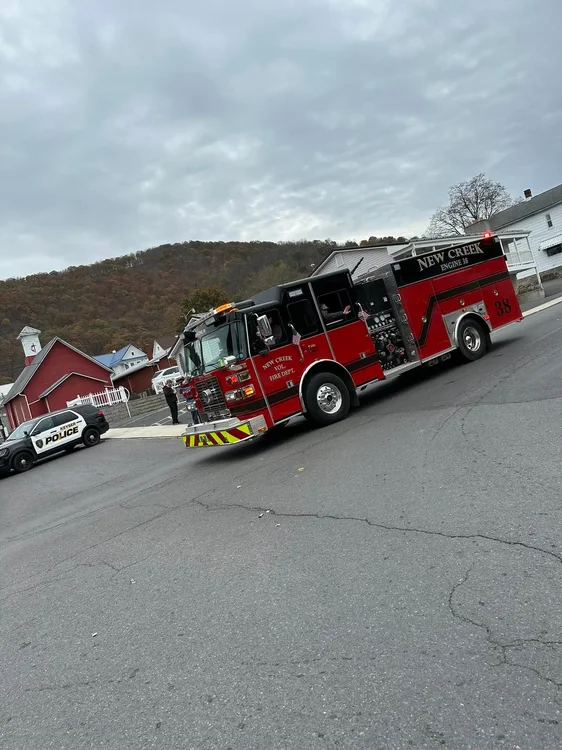 Could contain: outdoor, vehicle, land vehicle, wheel, sky, truck, transport, firefighter, road, fire, fire department, fire apparatus, emergency service, emergency vehicle, auto part, rescue, parked, red