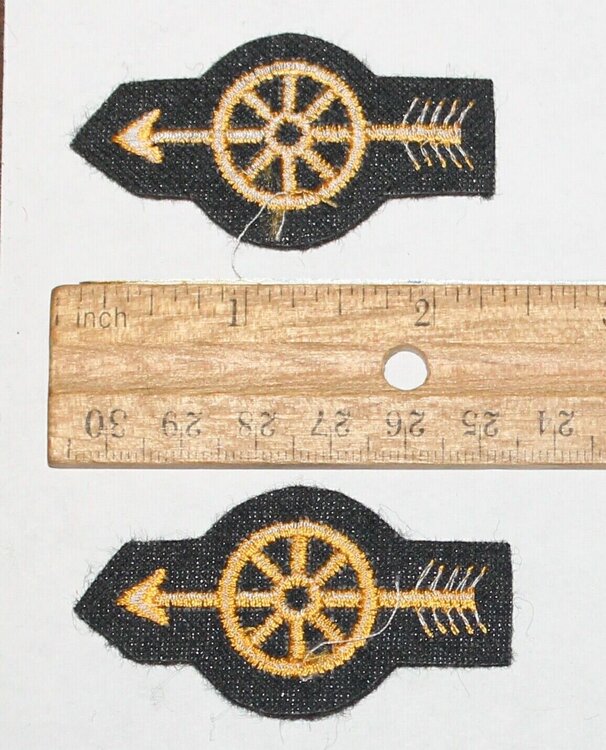 Could contain: text, symbol, emblem, measuring stick