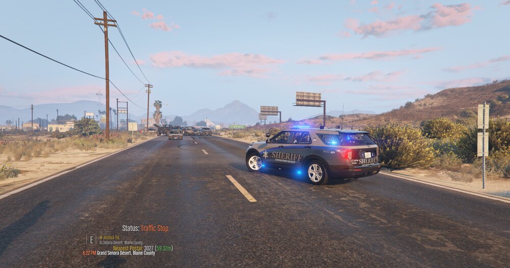 Could contain: outdoor, vehicle, sky, land vehicle, wheel, car, road, tire, motorsport, asphalt, blue, mountain, ground, street