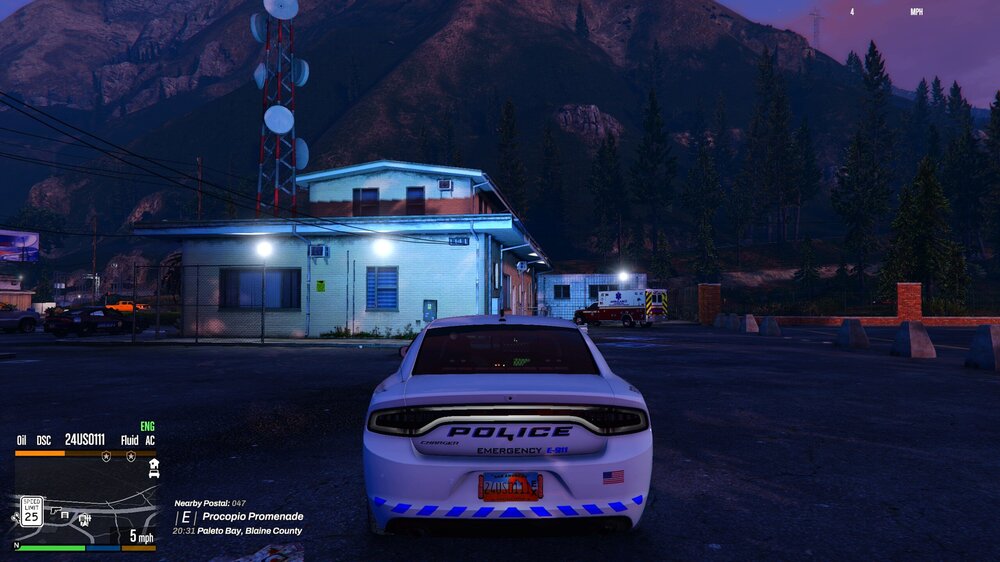 Could contain: text, vehicle, land vehicle, outdoor, sky, mountain, car, wheel, night