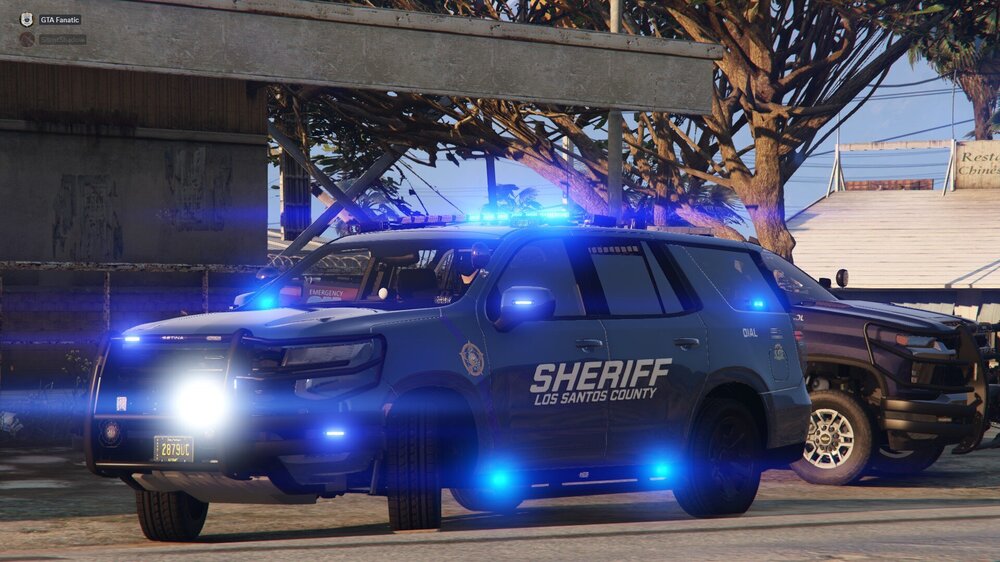 Could contain: vehicle, land vehicle, wheel, tire, outdoor, auto part, transport, truck, bumper, car, building, blue, automotive exterior, road, pickup truck, motor vehicle, automotive tire, parked, light