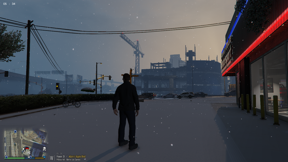 Could contain: outdoor, sky, clothing, person, screenshot, electricity, street, winter, city