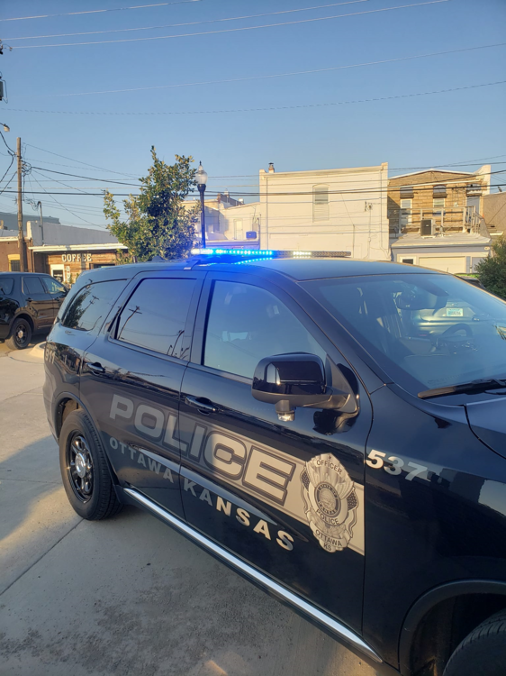 Could contain: vehicle, land vehicle, outdoor, wheel, text, sky, transport, full-size car, auto part, tire, automotive exterior, family car, car, blue, parked