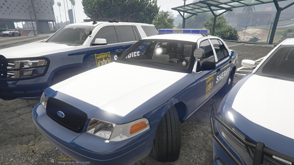 Could contain: vehicle, land vehicle, wheel, outdoor, car, tire, police car, law enforcement, automotive exterior, auto part, ford crown victoria police interceptor, motor vehicle, bumper, police, parked