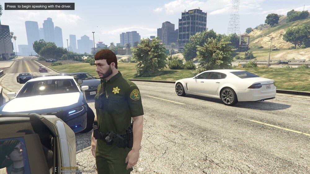 Could contain: outdoor, vehicle, land vehicle, clothing, person, wheel, text, man, sky, tire, automotive design, car, ground